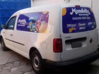 VW Caddy de reparto rotulado para Oreo, unidad de una flotilla de distribución. VW Caddy de reparto rotulado para Oreo, unidad de una flotilla de distribución.